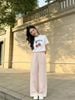  Bộ Áo sơ mi và quần dài cạp chun - be hồng nhạt logo trắng set 