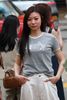  Áo phông xám, logo nơ trắng đính xequin ngực 