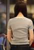  Áo phông xám, logo nơ trắng đính xequin ngực 