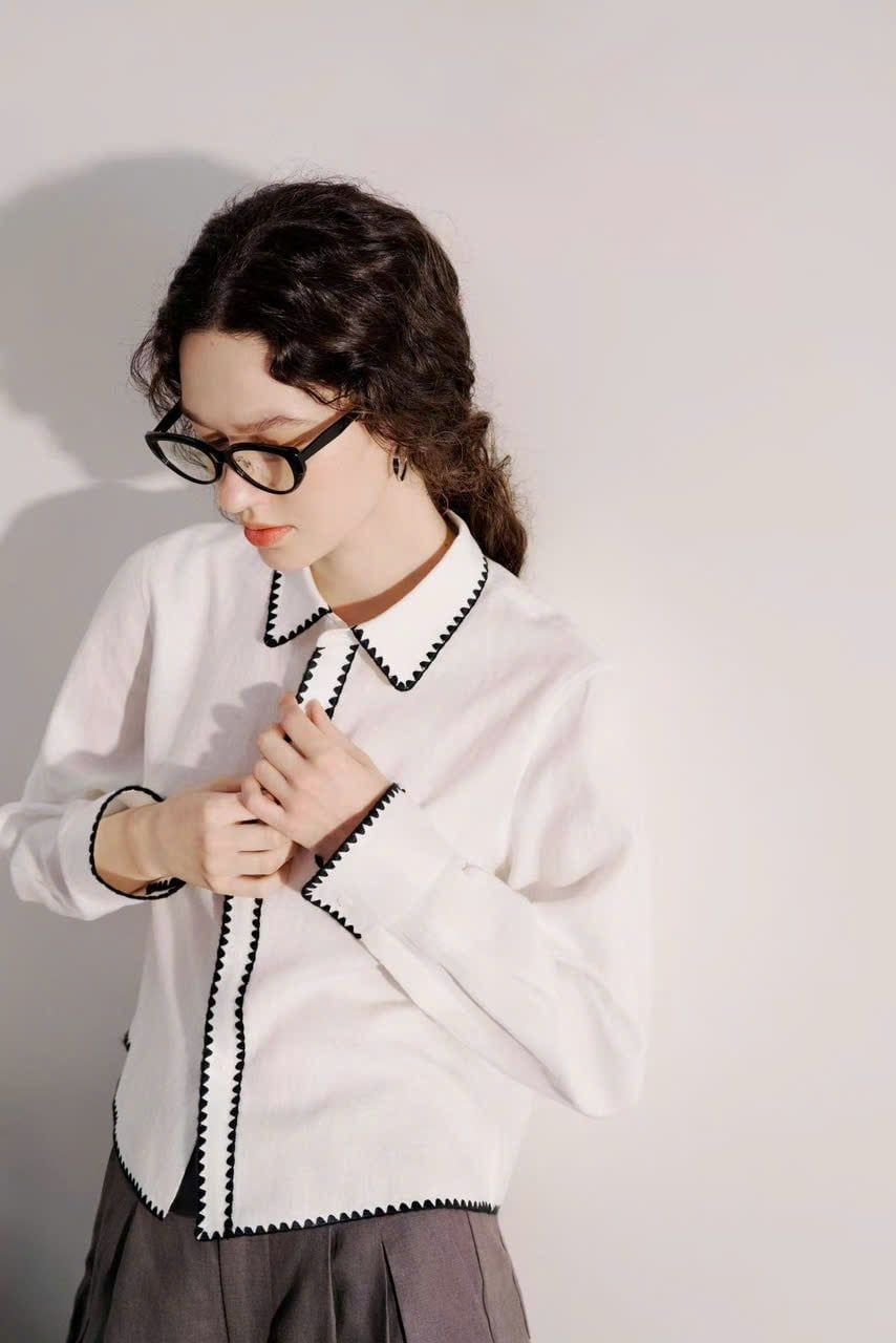  Áo sơ mi trắng viền đen zizac 