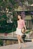  Áo hồng họa tiết nơ in chìm ngắn tay 