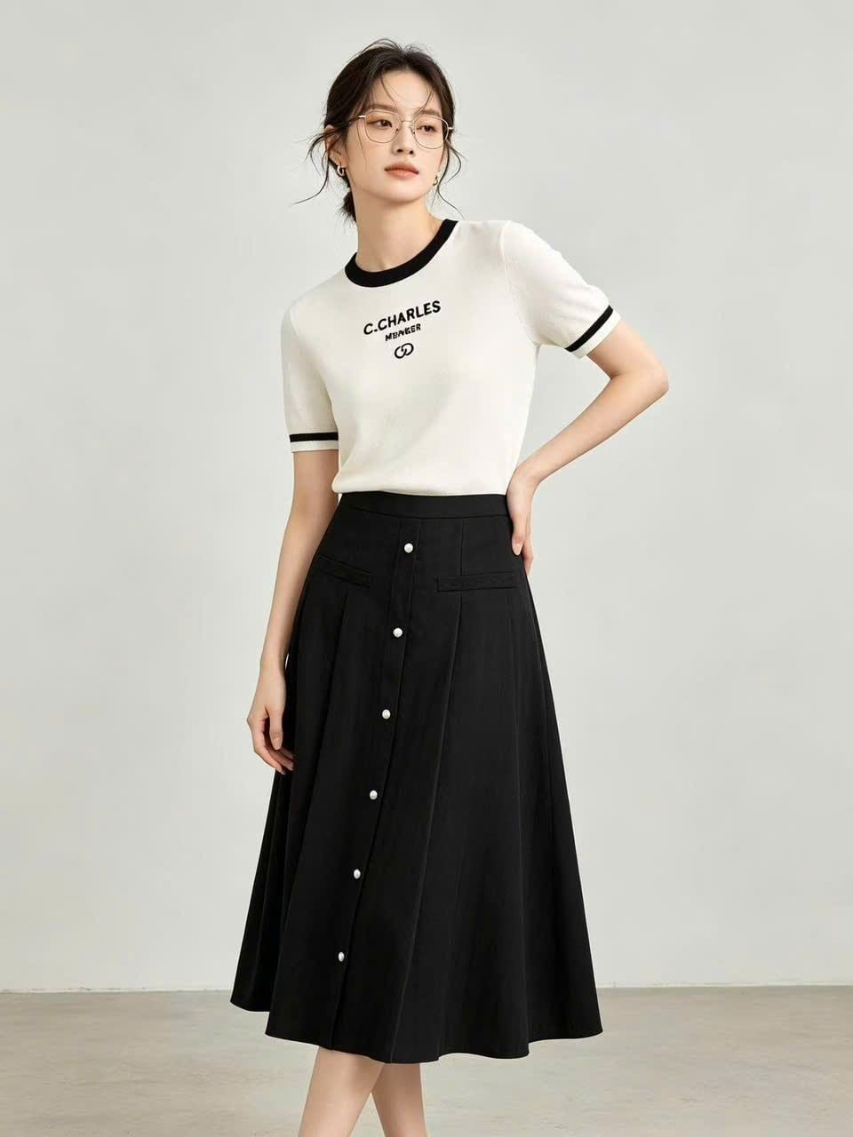  1.Chân váy lụa đen - cúc ngọc 