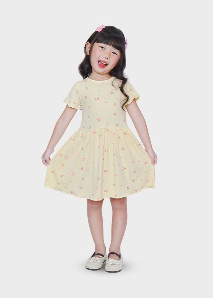Đầm Thun Kiểu Bé Gái Kem Gân Hoạ Tiết Hoa
