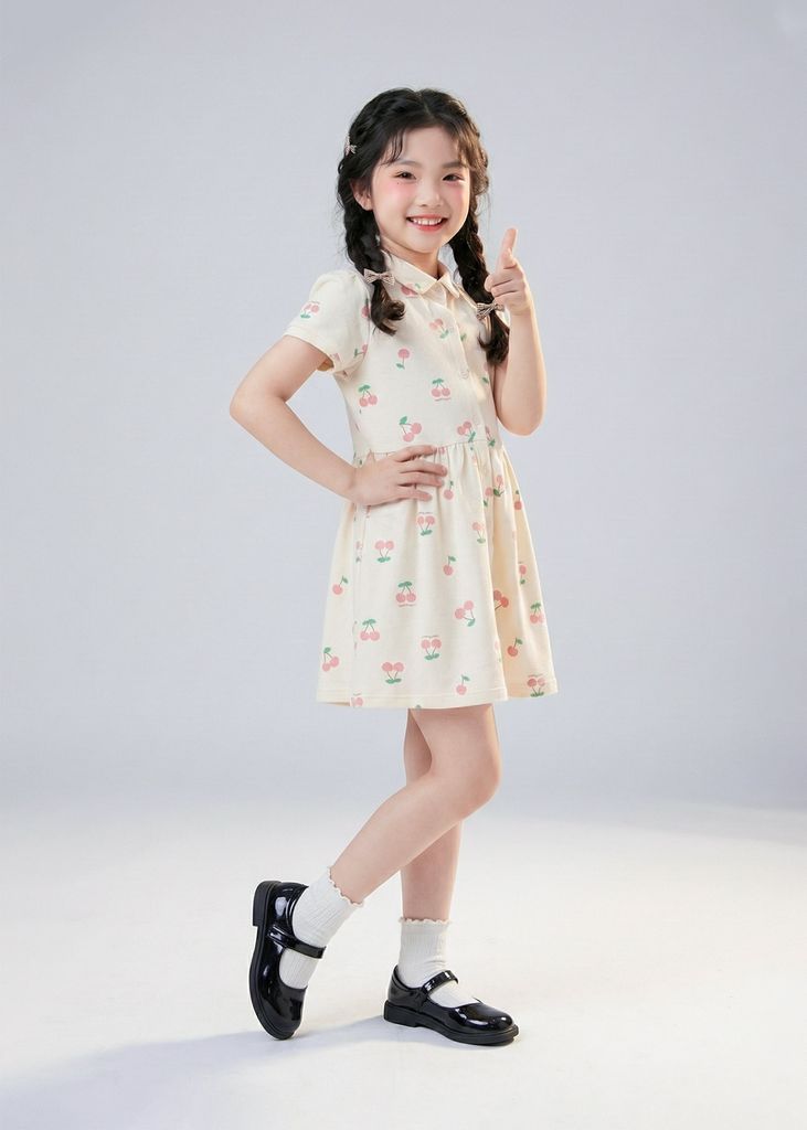 Đầm Polo Ngắn Tay Bé Gái Kem Hoạ Tiết Cherry