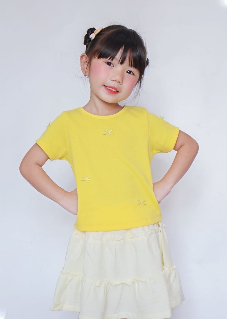 Áo Thun Gân Ngắn Tay Bé Gái Vàng Nơ