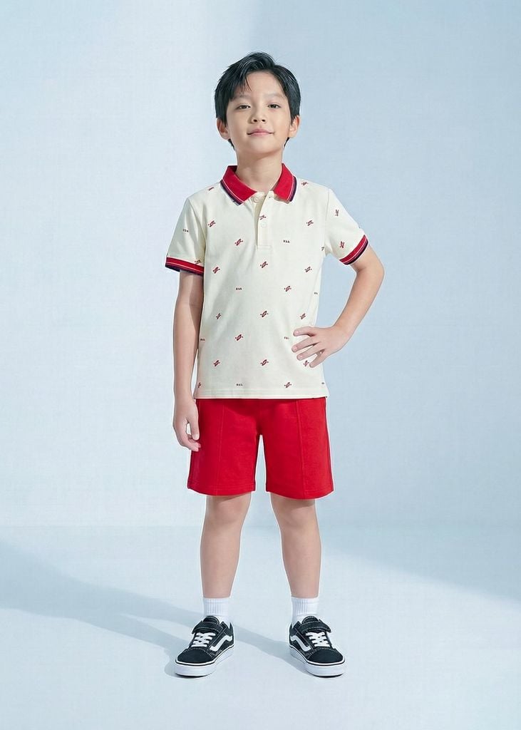 Set Polo Cổ Dệt Bé Trai Kem Hoạ Tiết Thuyền Kayak Phối Đỏ