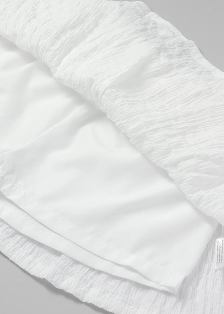 Chân Váy Quần Bé Gái Kate Nhún Trắng Kem