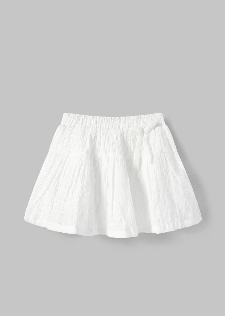 Chân Váy Quần Bé Gái Kate Nhún Trắng Kem