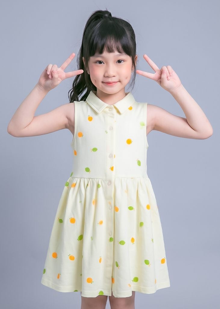 Đầm Polo Cộc Tay Bé Gái Kem Hoạ Tiết Quả Chanh