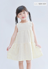 Đầm Thun Kiểu Hai Tầng Bé Gái Vàng Nhạt