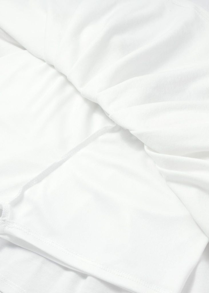 Set Polo Cộc Tay & Chân Váy Xếp Ly Bé Gái Trắng Phối Hồng