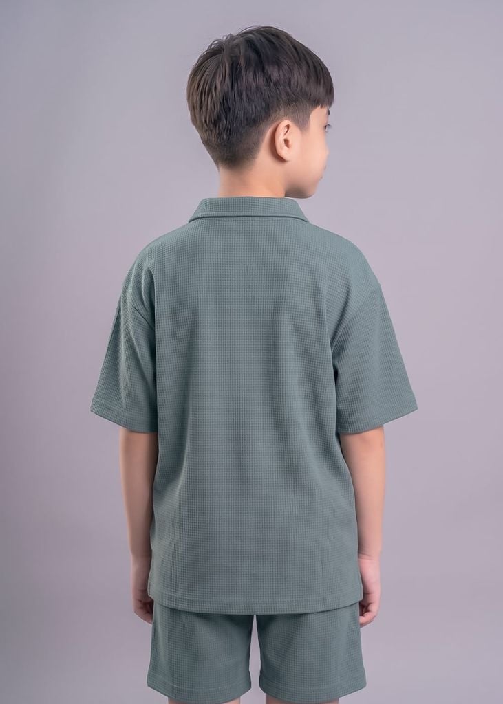 Set Polo Form Rộng Bé Trai Xanh Teal Thêu Cây Dừa