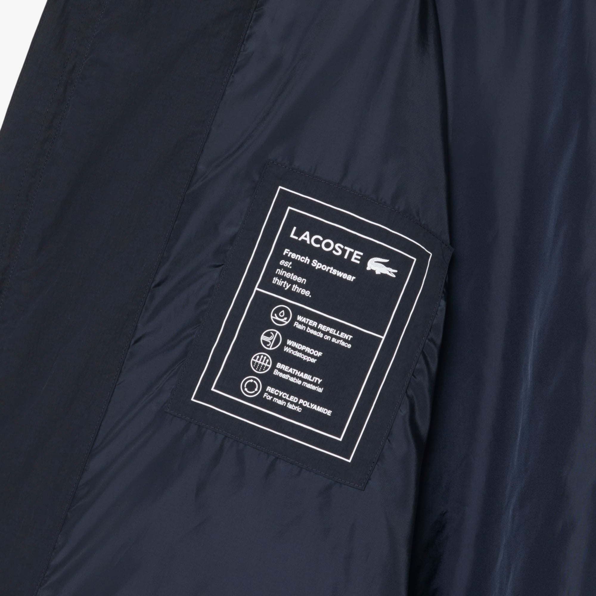 Áo Khoác Lacoste Nam Dáng Oversize Chất Liệu Taffeta Dập Nổi Chống Thấm Nước