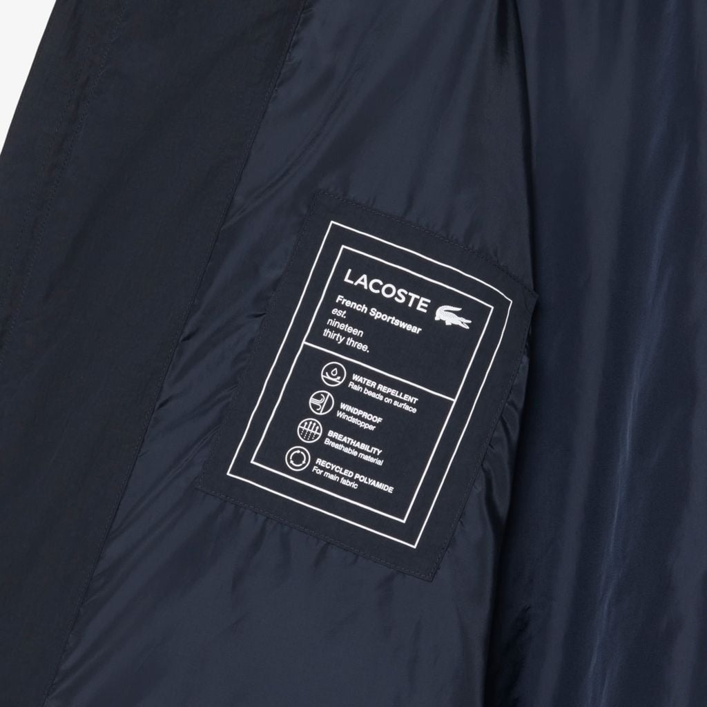Áo Khoác Lacoste Nam Dáng Oversize Chất Liệu Taffeta Dập Nổi Chống Thấm Nước