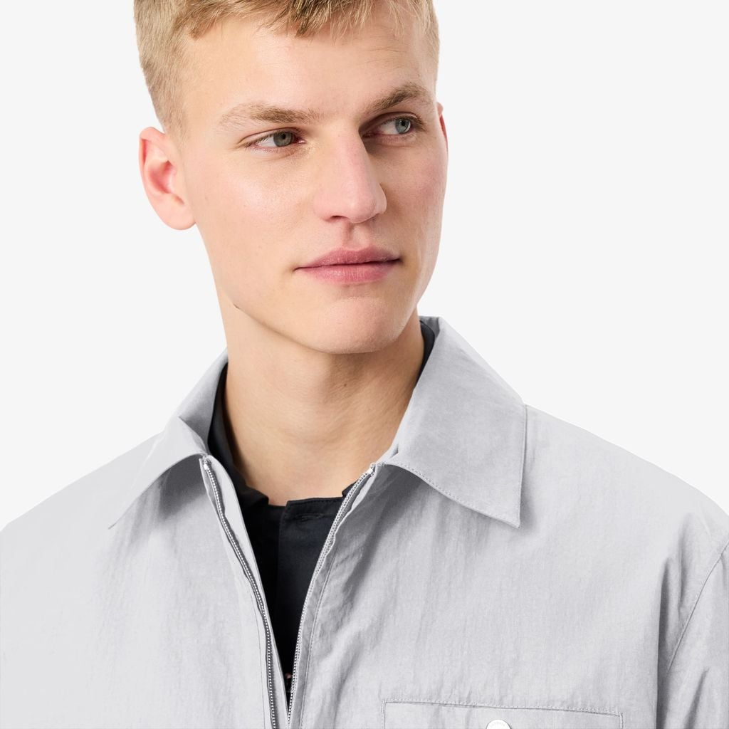Áo Khoác Lacoste Nam Dáng Oversize Chất Liệu Taffeta Dập Nổi Chống Thấm Nước