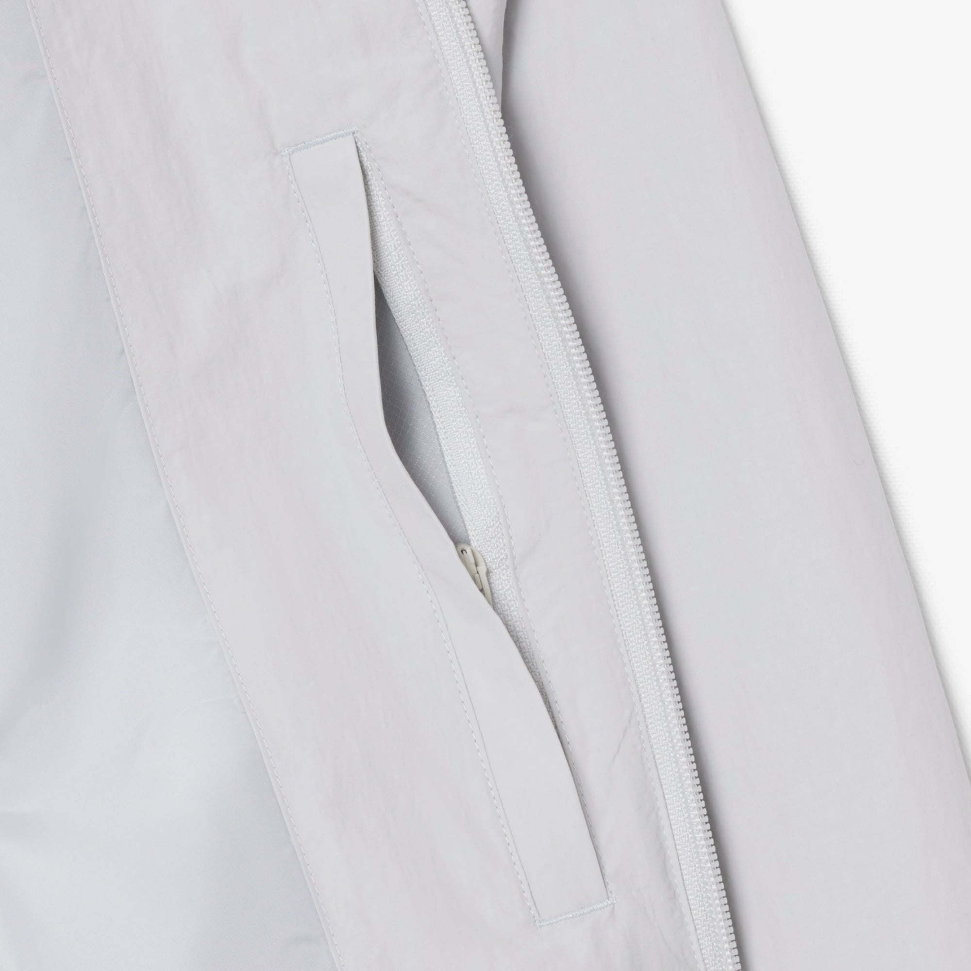 Áo Khoác Lacoste Nam Dáng Oversize Chất Liệu Taffeta Dập Nổi Chống Thấm Nước