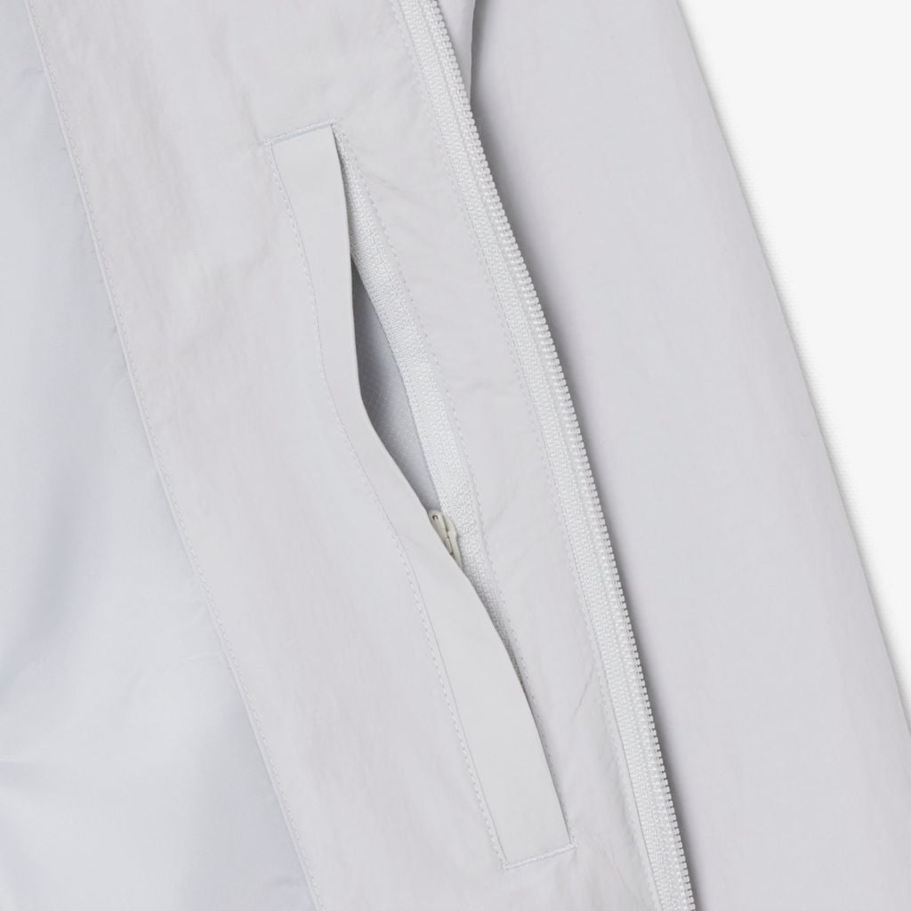 Áo Khoác Lacoste Nam Dáng Oversize Chất Liệu Taffeta Dập Nổi Chống Thấm Nước