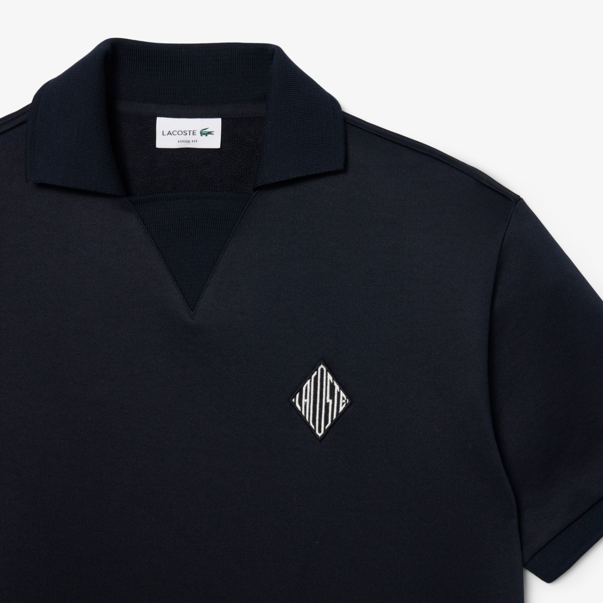 Áo Polo Lacoste Nam Dáng Rộng Chất Liệu Nỉ Điểm Nhấn Huy Hiệu