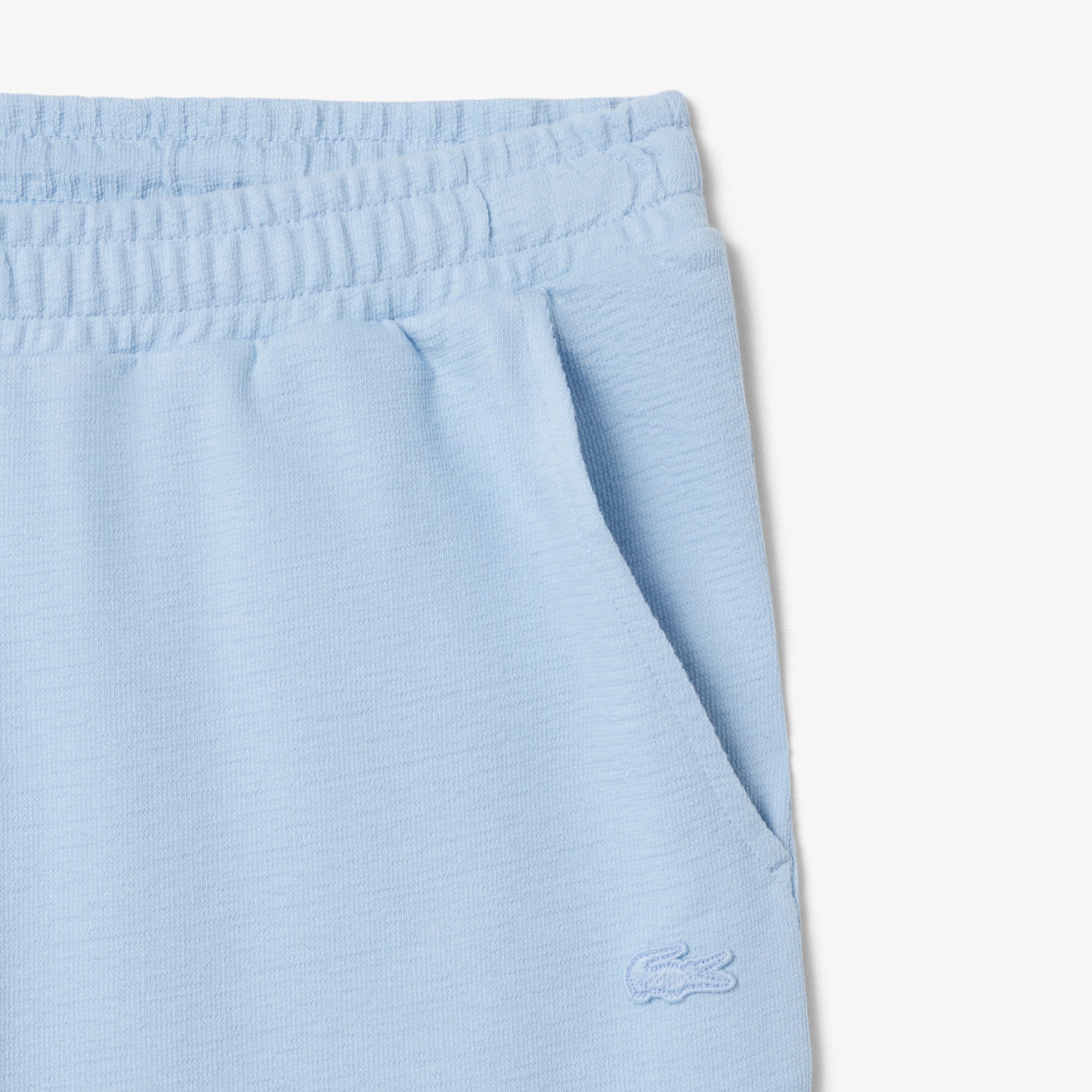 Quần Ngắn Lacoste Nam Ống Suông Chất Liệu Jersey Dập Nổi