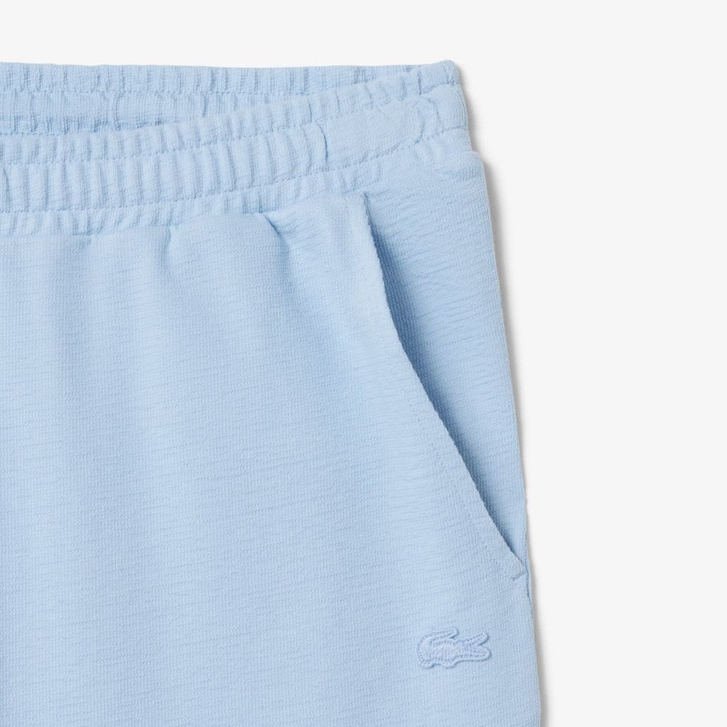 Quần Ngắn Lacoste Nam Ống Suông Chất Liệu Jersey Dập Nổi