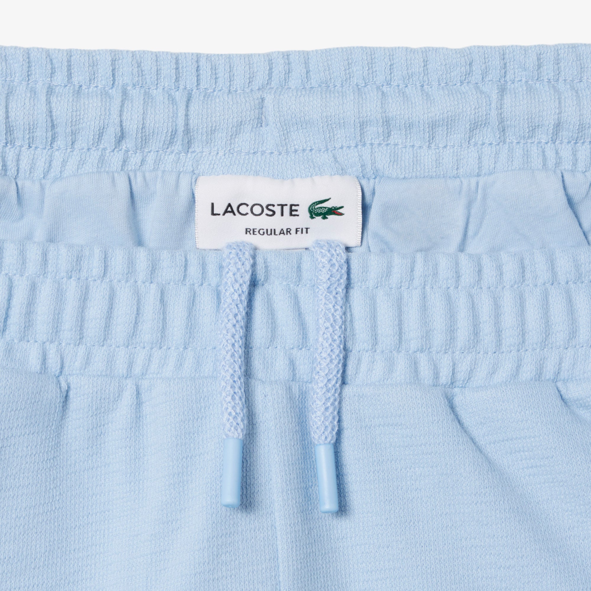 Quần Ngắn Lacoste Nam Ống Suông Chất Liệu Jersey Dập Nổi
