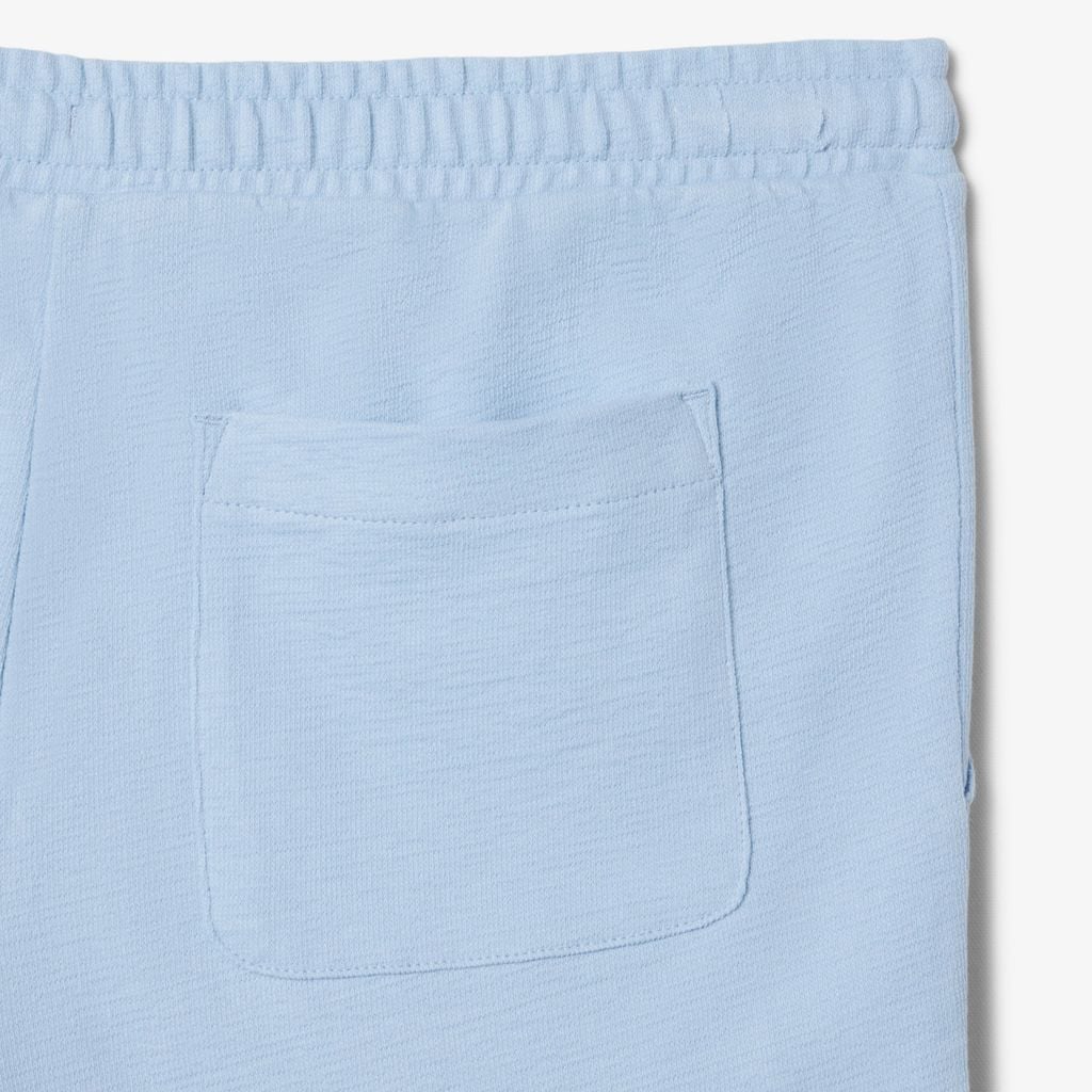 Quần Ngắn Lacoste Nam Ống Suông Chất Liệu Jersey Dập Nổi