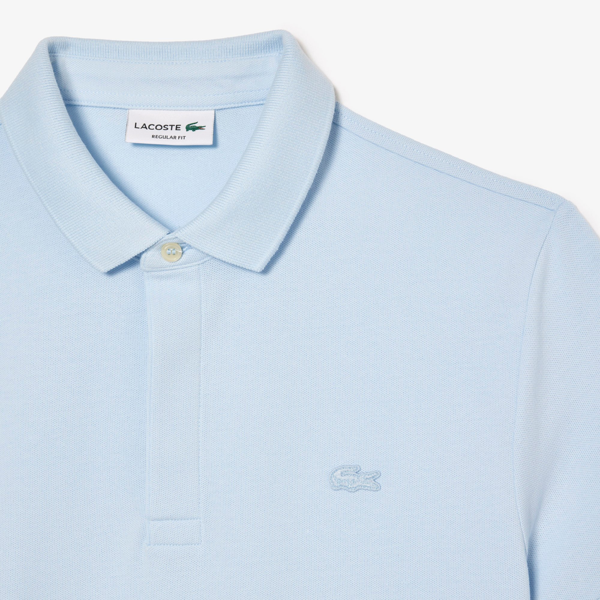 Áo Polo Lacoste Nam Paris Dáng Suông Piqué Co Dãn