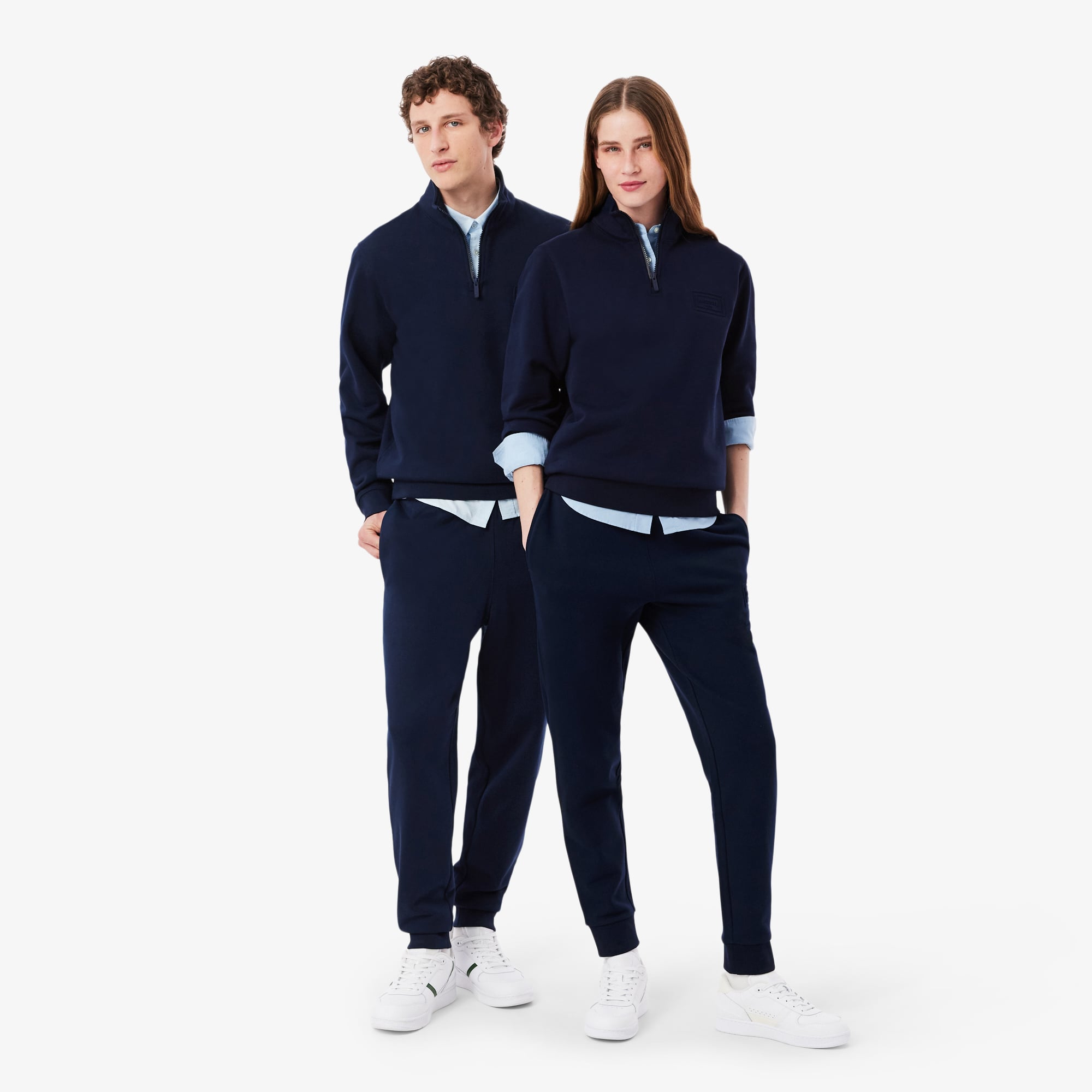 Quần Nỉ Lacoste Unisex Ống Côn Logo Dập Nổi