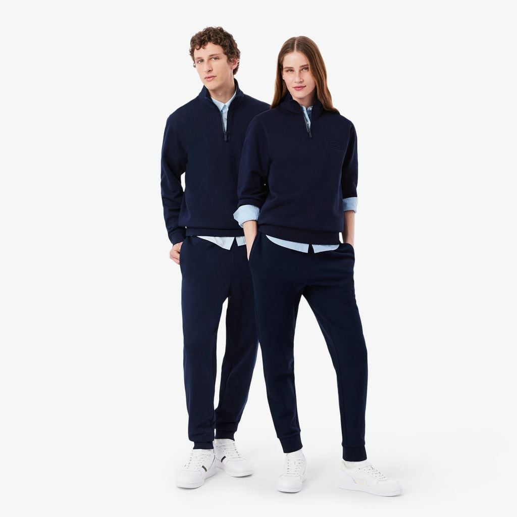 Quần Nỉ Lacoste Unisex Ống Côn Logo Dập Nổi