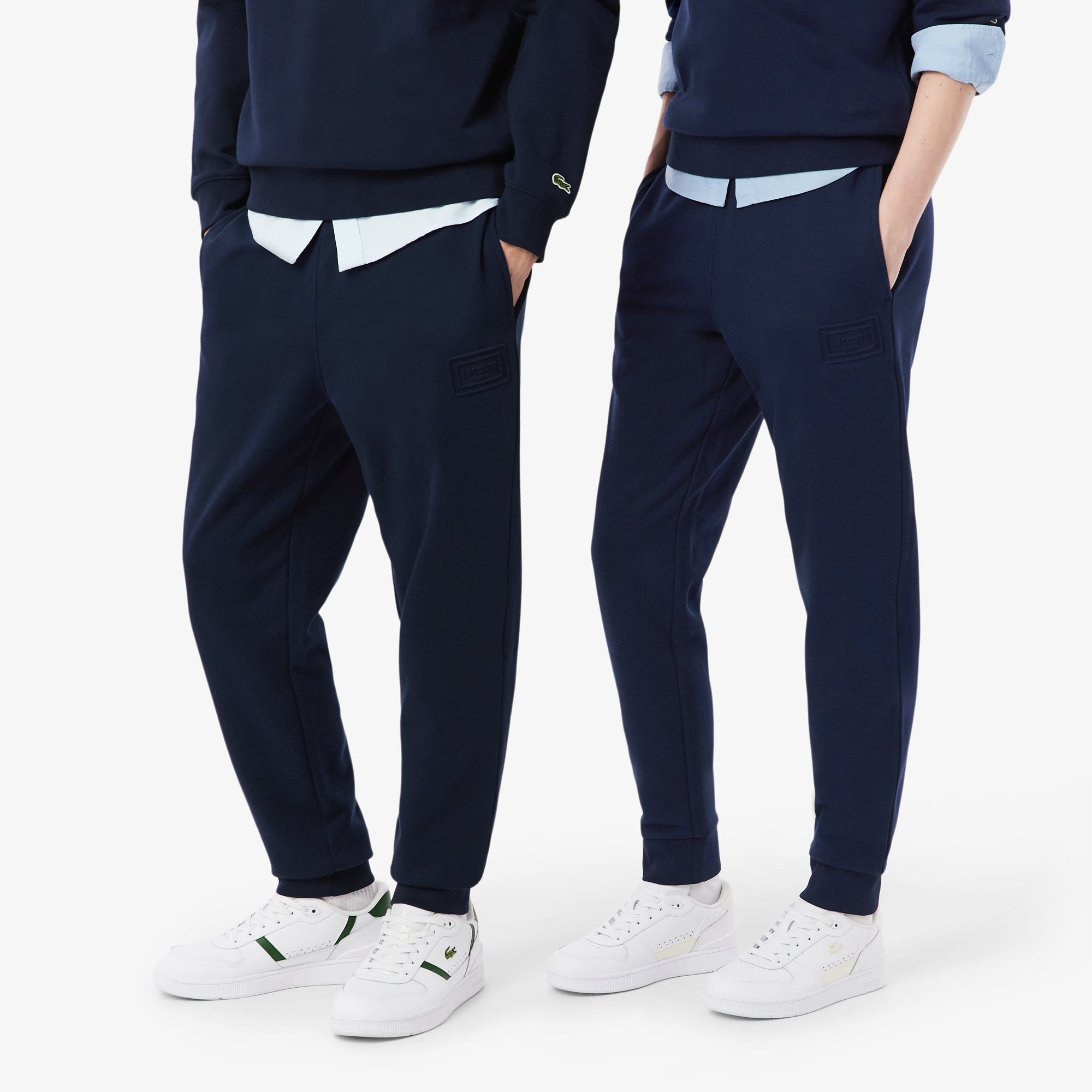 Quần Nỉ Lacoste Unisex Ống Côn Logo Dập Nổi