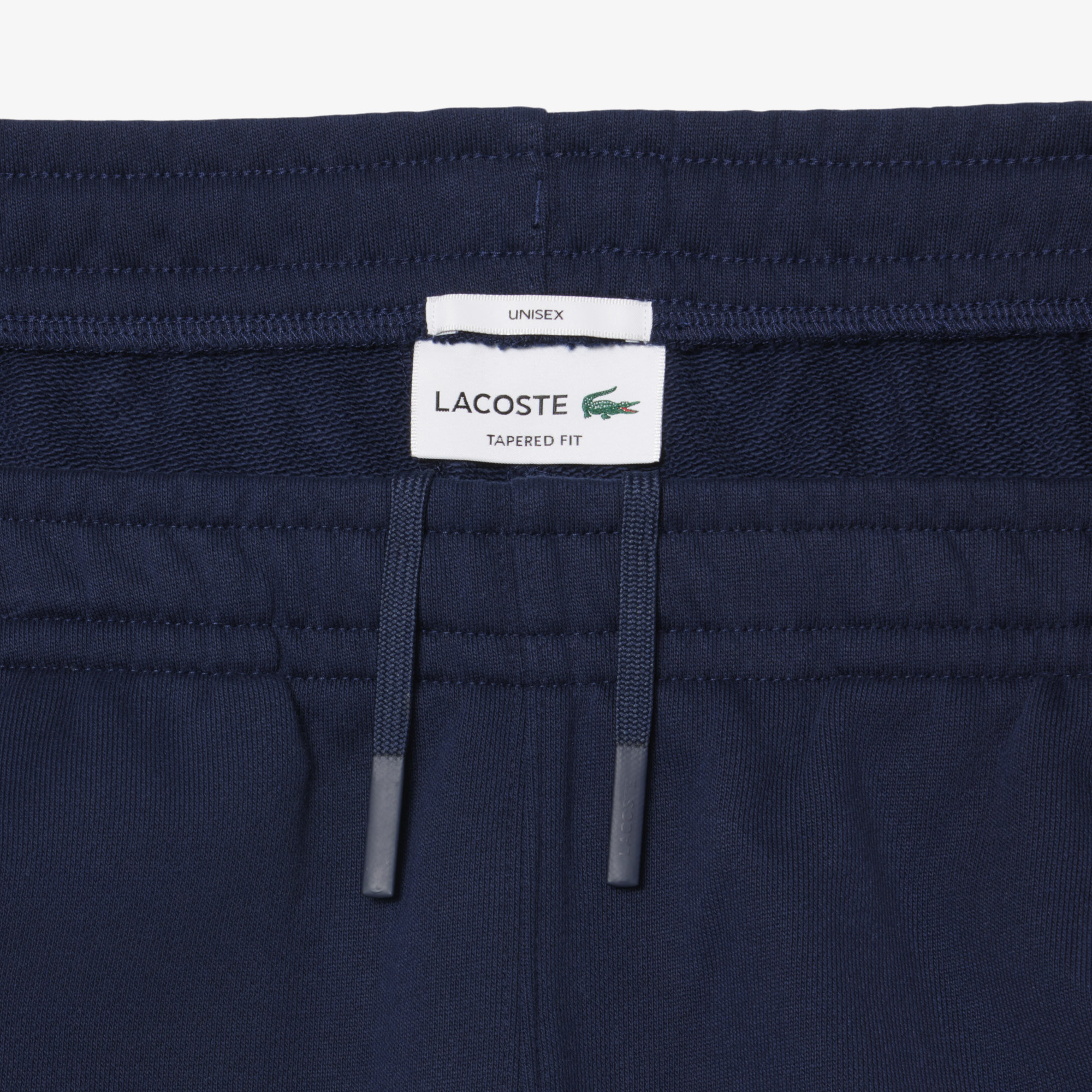 Quần Nỉ Lacoste Unisex Ống Côn Logo Dập Nổi
