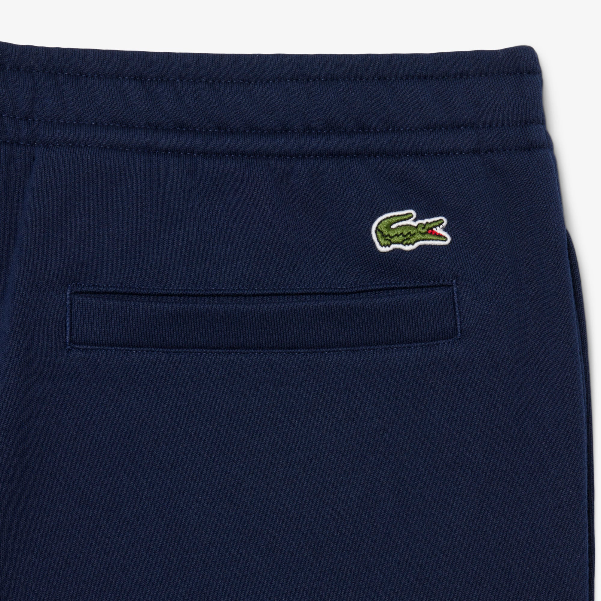 Quần Nỉ Lacoste Unisex Ống Côn Logo Dập Nổi
