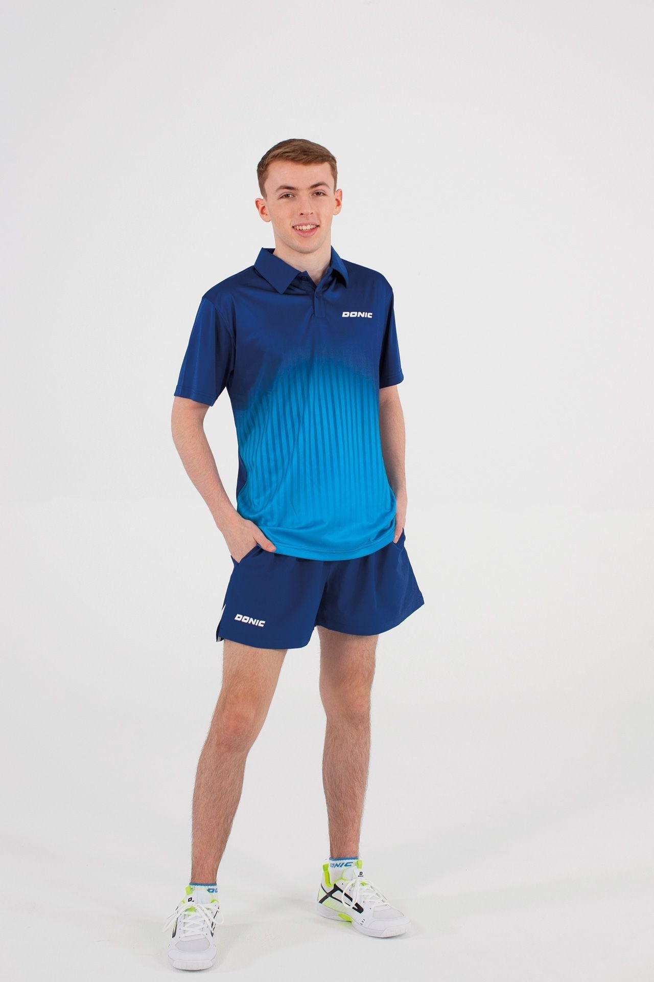 Áo thun cổ tròn Donic Driva Navy-Cyan phối đồng bộ cùng Polo Nuvon