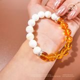  Vòng Tay Hoàng bạch ( Thạch Anh Vàng 5A 9mm + Vỏ Sò Tai Tượng 3A 10mm ) 