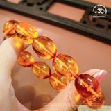  Vòng Tay Hổ Phách Cognac Oliu Hoa Bay 15mm 27gram 