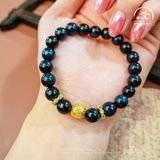  Vòng Tay Thạch Anh Mắt Chim Ưng 8mm 5A Phối Charm Chữ Vạn 