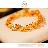  Vòng Tay Hổ Phách Cognac Phối Charm Đệm Hoa Cúc 