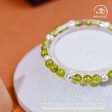  Vòng Tay Đá Peridot 6mm 5A Phối Charm Bi Bạc 