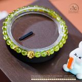  Vòng Tay Đá Peridot 6mm 5A Phối Charm Hoa Mai 