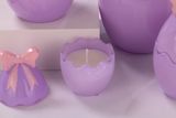 Easter Egg Glass Candle Jar With A Bow In Purple And Yellow