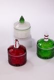Glass Candle Jar With Christmas Decor On The Lid