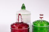 Glass Candle Jar With Christmas Decor On The Lid
