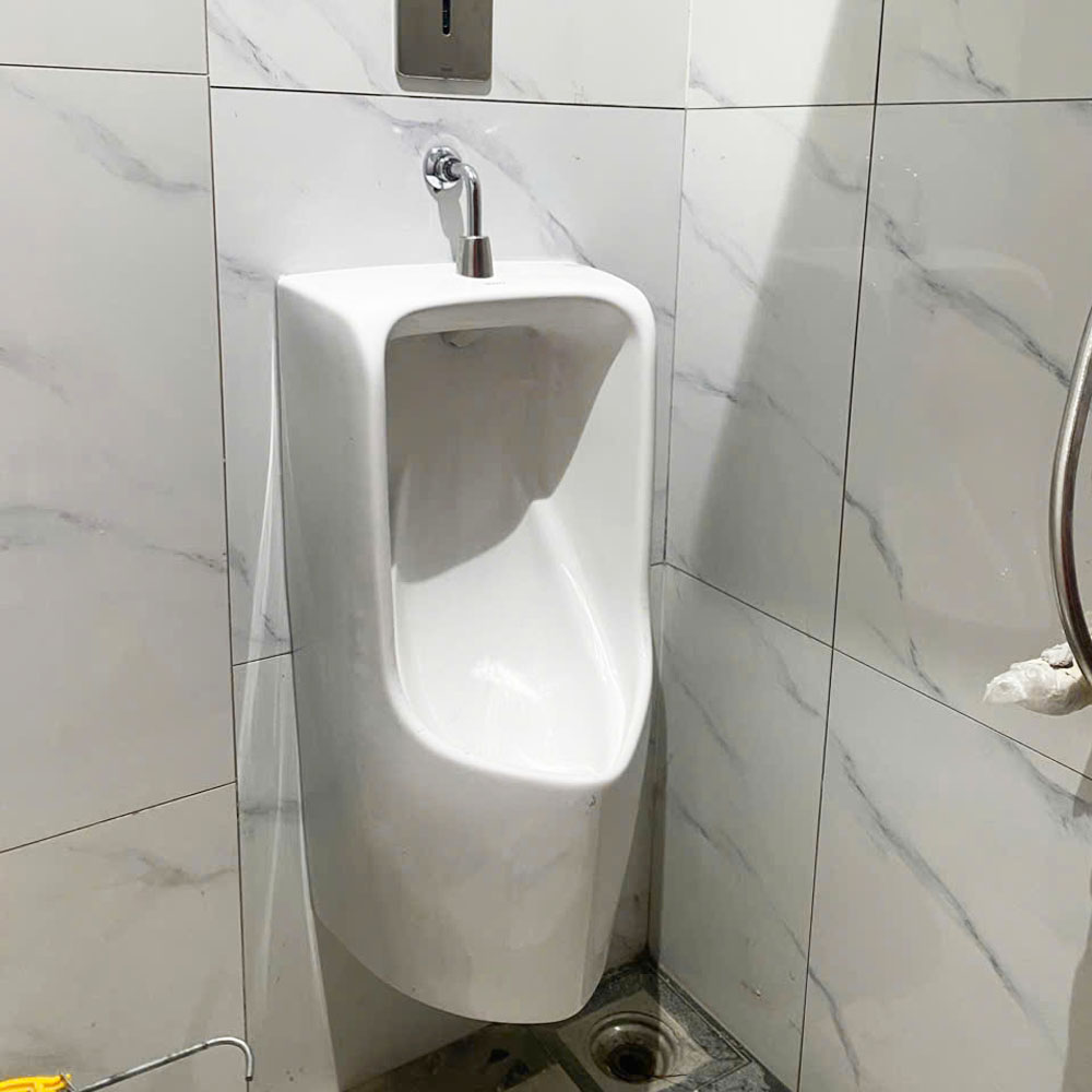 Bồn tiểu nam TOTO UT570T (Đường cấp nước phía trên)