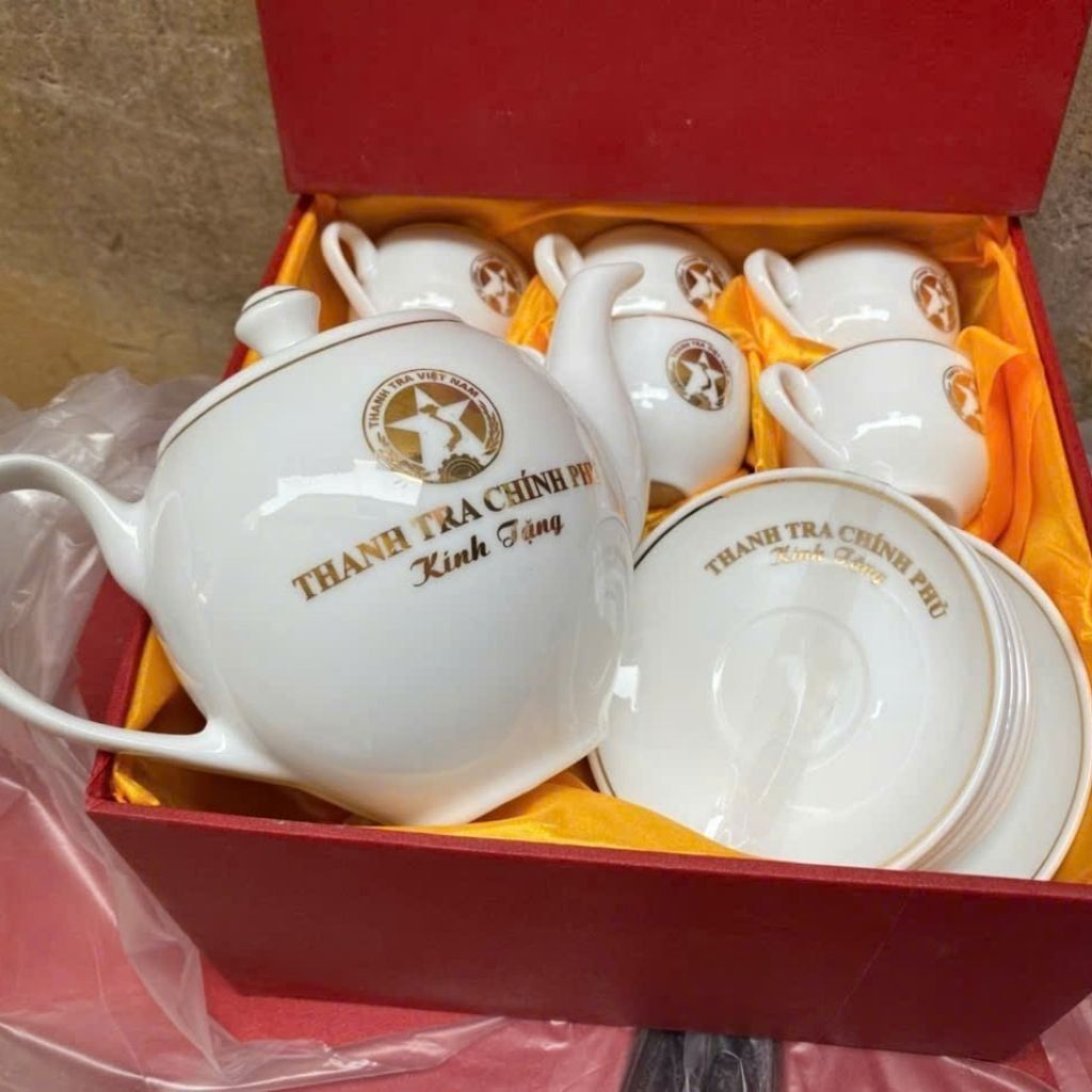  Bộ ấm chén in Thanh Tra Chính Phủ gốm sứ Bát Tràng vẽ vàng  BKCECN-10231 