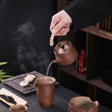  Bộ Ấm Trà Gốm Thô Cổ Điển Quai Xách Mây Kèm Bếp Nến BKCECN-10646 