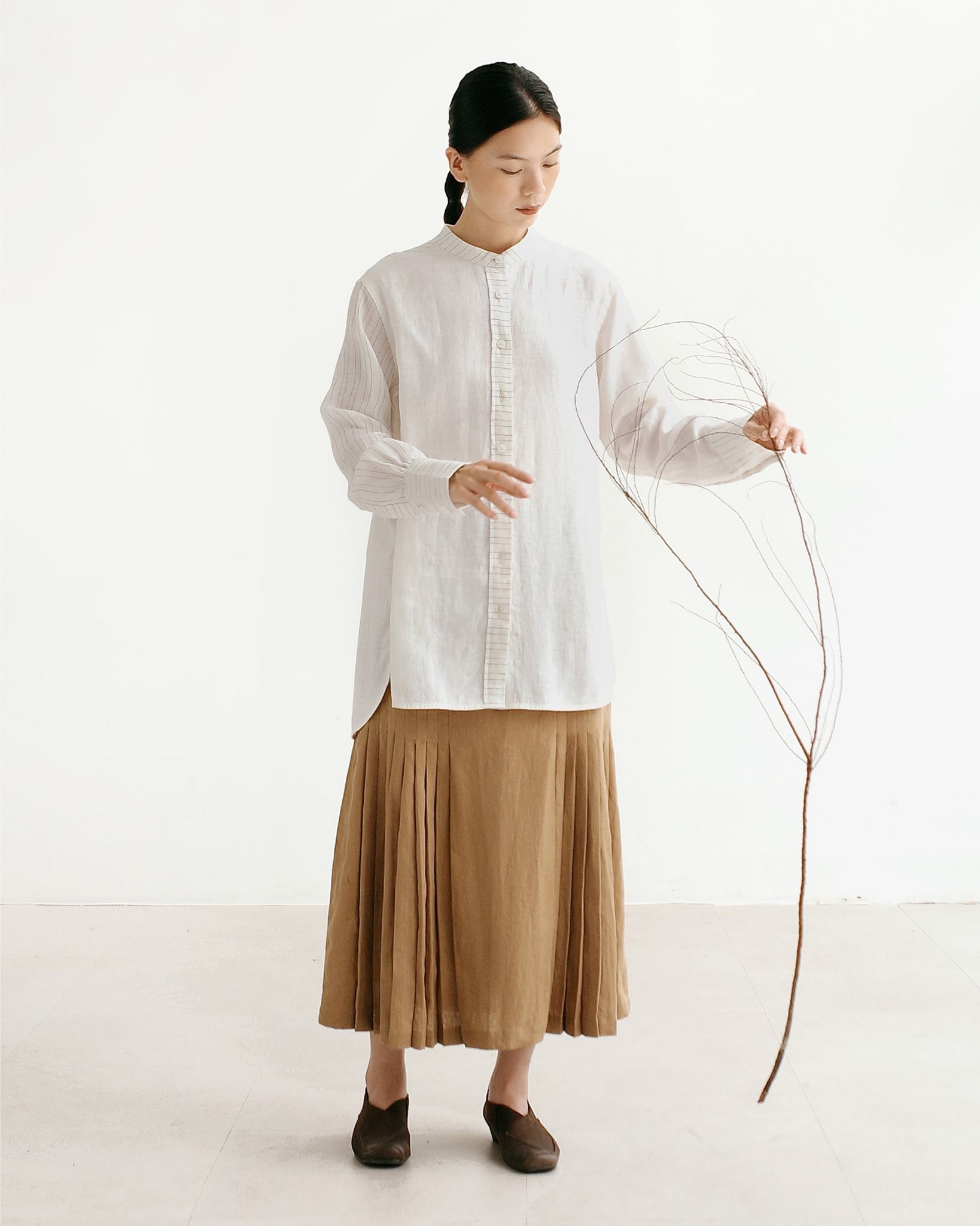 Chân Váy Linen Xếp Ly Xoè Nhẹ Sang Trọng - chính diện mặt trước