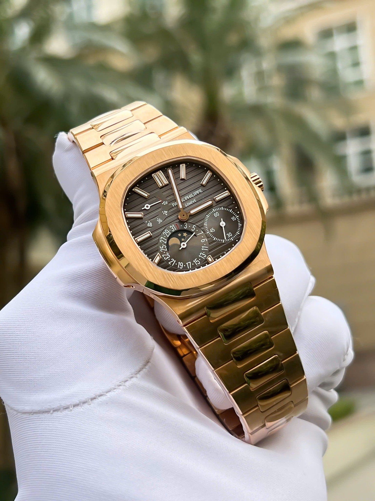 Đồng hồ Patek Philippe Nautilus Moon Phase 5712/1R-001 Chế Tác Bọc Vàng Thật