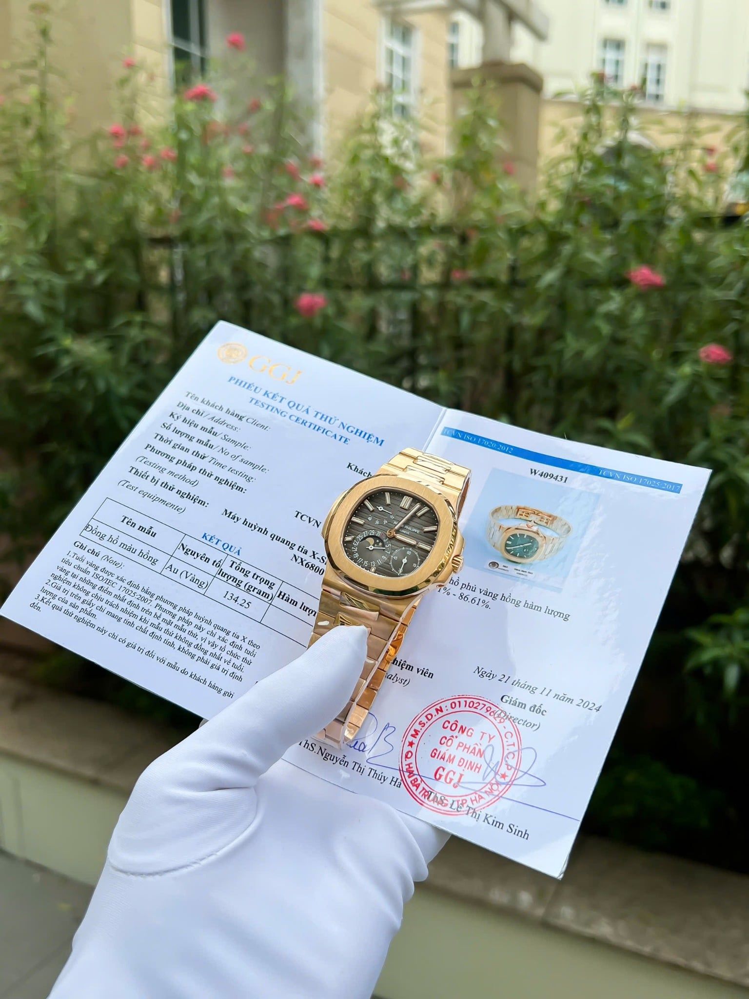 Đồng hồ Patek Philippe Nautilus Moon Phase 5712/1R-001 Chế Tác Bọc Vàng Thật