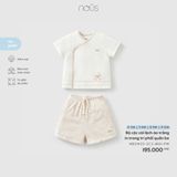 Bộ cộc cài lệch áo trắng in trang trí phối quần be Nous