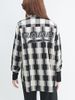 Sơ mi oversize tay dài caro in logo lưng